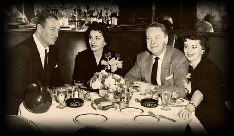 John & Pilar Wayne with friends